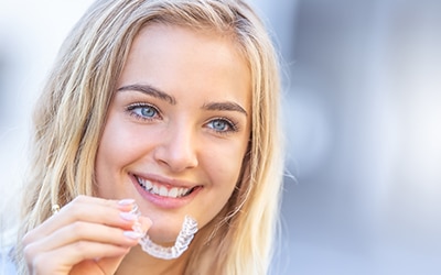 Woman holding retainer